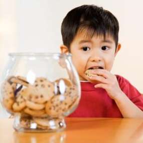 Image result for children eating biscuit